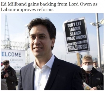 Photo of TUSC protester behind Miliband used by the Independent