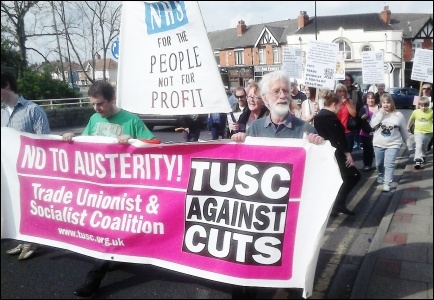 Care UK workers and supporters march in Doncaster after lobbying Ed Miliband's surgery